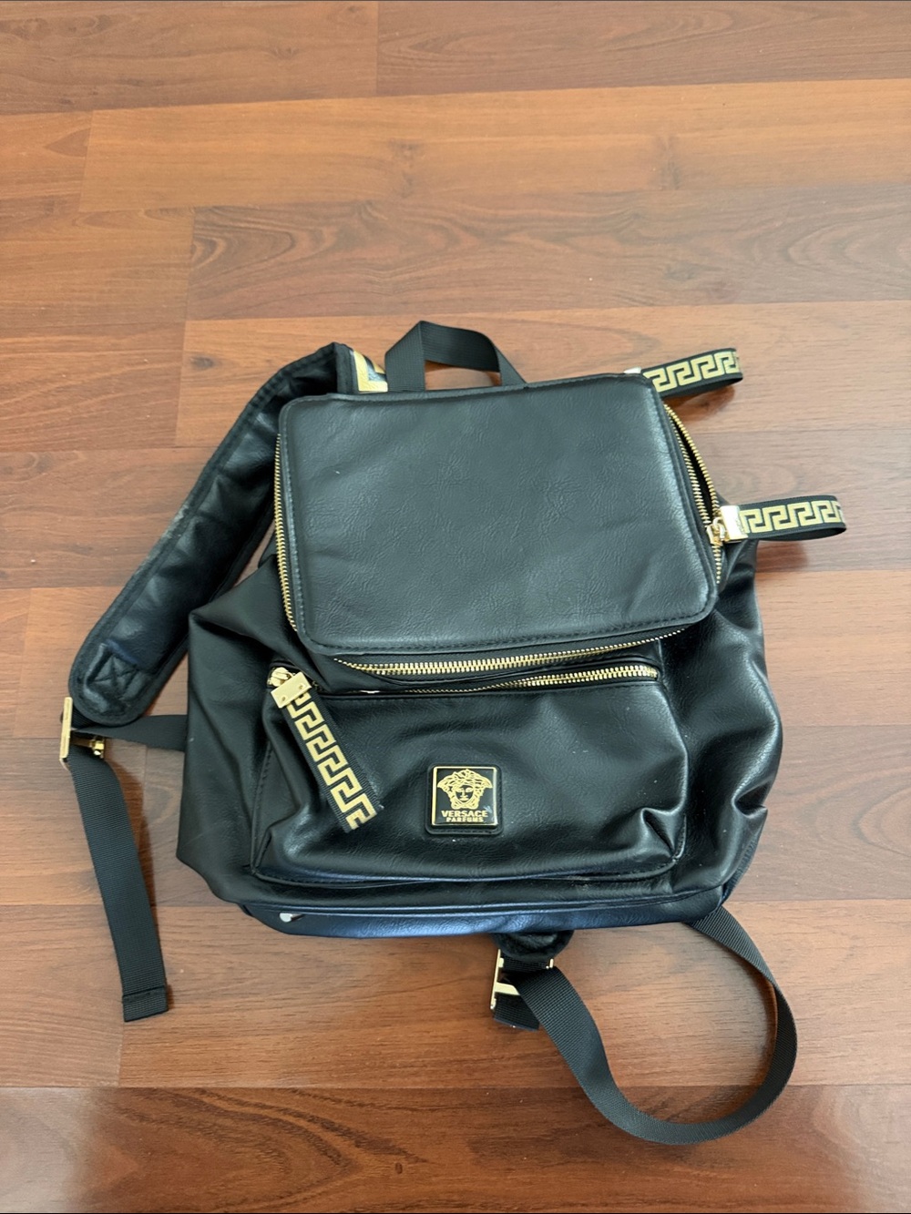 Versace Black Backpack with Gold Greek Key Accents